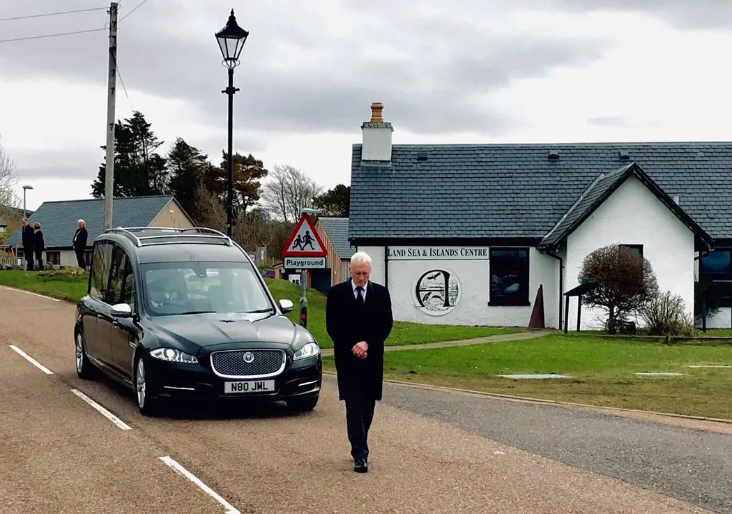 McLellan Funeral Directors - our professional funeral directors leading a funeral procession
